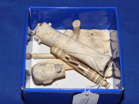 Box with ivory pieces.