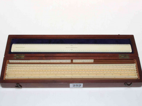 Set of ivory rules by Elliott Bros. London, in mahogany fitted case, 36cm...