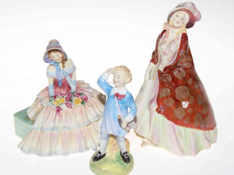 Three Royal Doulton figures, Paisley Shawl, Little Boy Blue and Day Dreams.