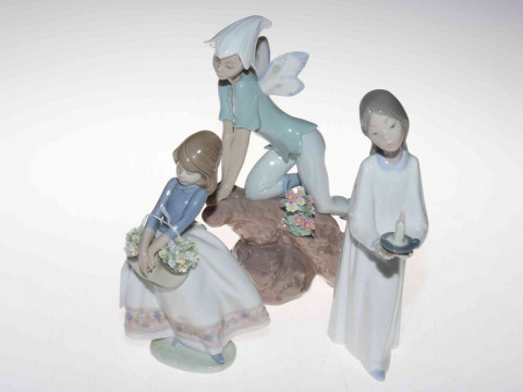 Three Lladro figures.