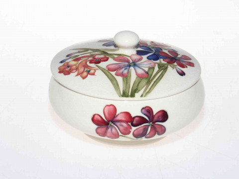 Moorcroft Spring Flowers powder bowl with lid, 10cm.