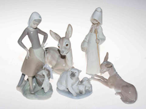 Five Lladro figurines including Polar Bears, Donkey, Deer, Goose, etc.