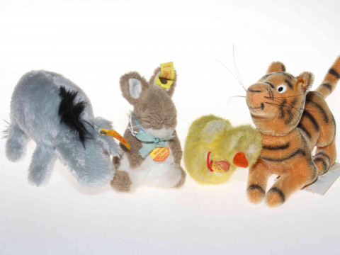 Four Steiff teddy bear toys; Eeyore, Tigger, Manni and Piccy (4).
