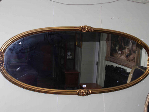 Large gilt oval framed wall mirror, 72cm by 172cm overall.