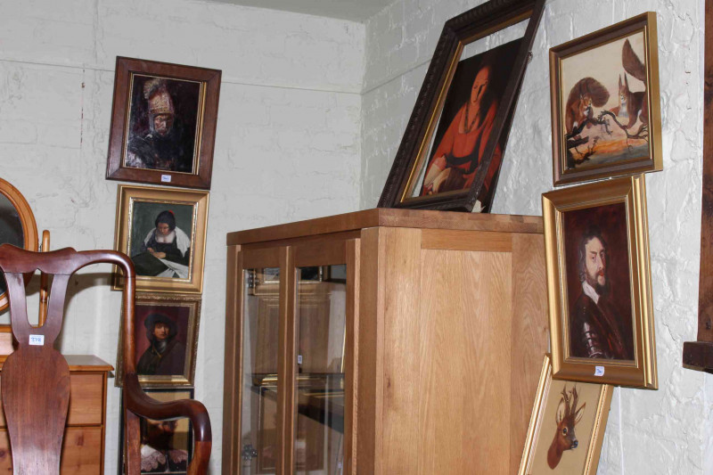 Large collection of framed oil paintings and prints.