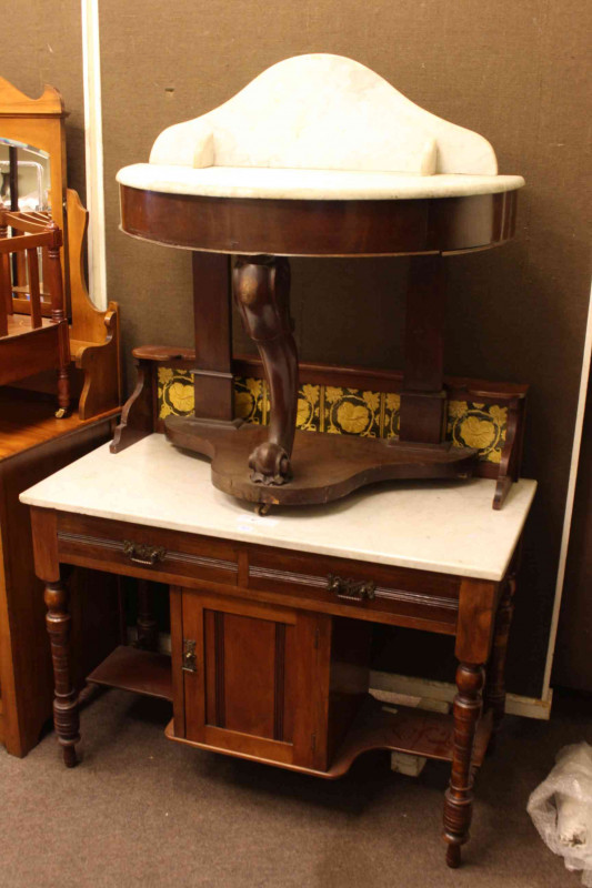 Victorian mahogany marble topped demi lune washstand and late Victorian walnut marble topped and tiled back washstand.
