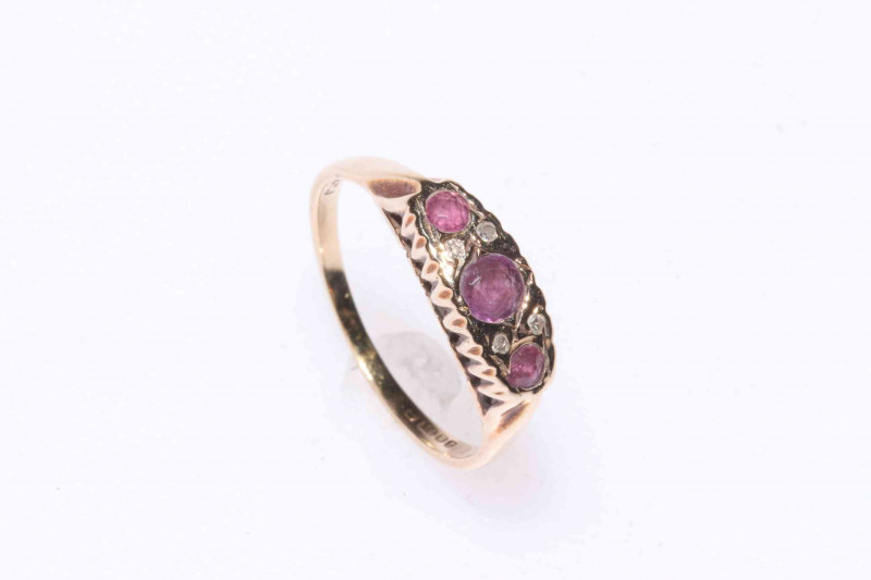 18 carat gold three stone diamond ring and 9 carat gold gem set ring (2).