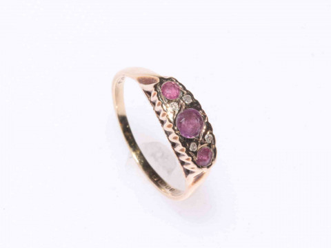 18 carat gold three stone diamond ring and 9 carat gold gem set ring (2). thumbnail