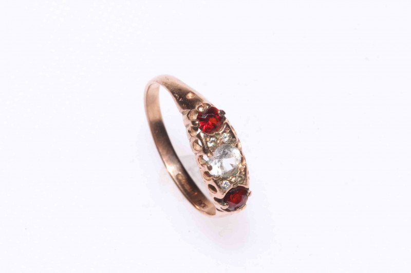 Three 9 carat gold rings.