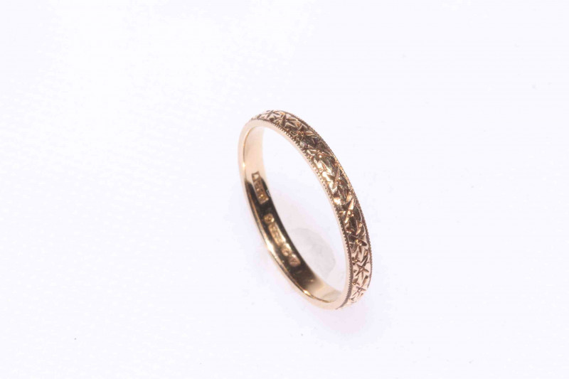 Diamond set eternity ring and 9 carat gold band (2).