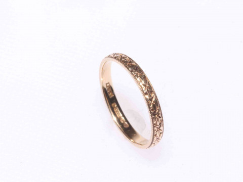 Diamond set eternity ring and 9 carat gold band (2). thumbnail
