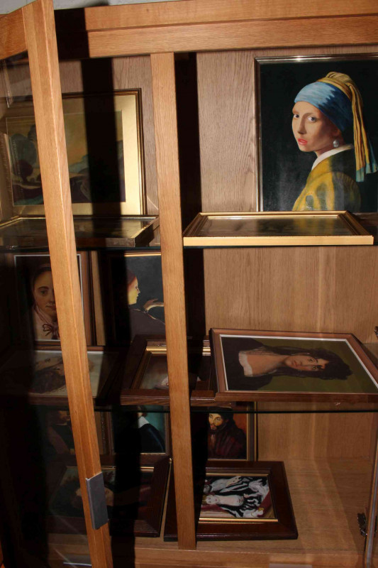 Large collection of framed oil paintings and prints.