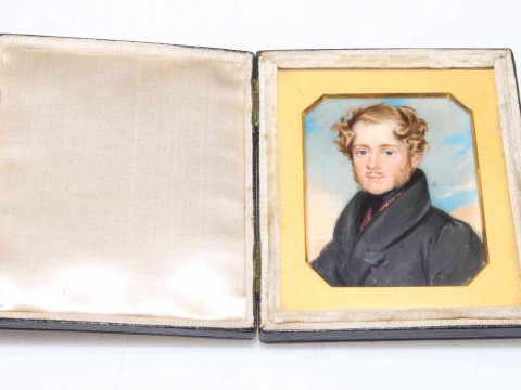 Portrait miniature of young gentleman in travel case with gilt slip, first...