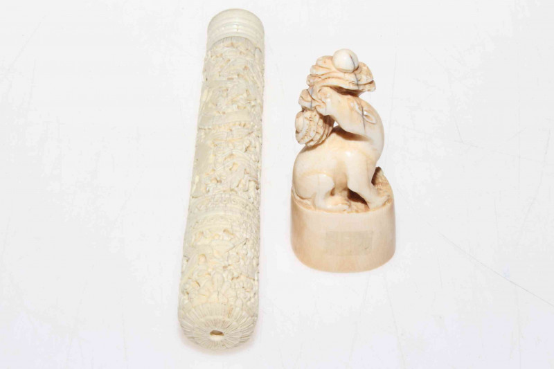 Chinese finely carved ivory bodkin case with contents, together with animal seal (2).