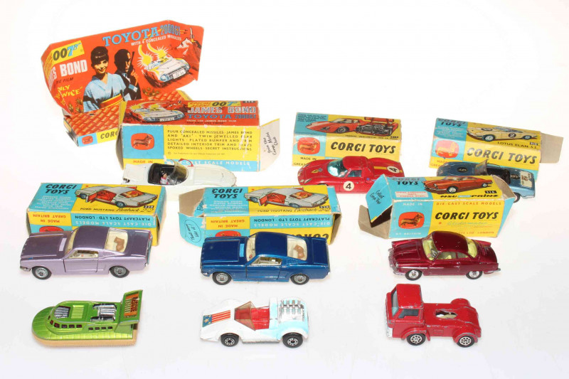 Collection of six boxed Corgi cars; Lotus Elan, NSU Prinz, Mustang Fastback x 2, Berlinetta and 007 Toyota; together with three others (9).
