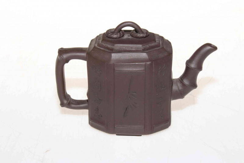 Yixing period teapot with bamboo styled spout and handle.