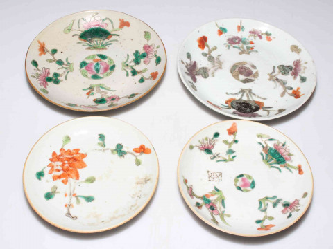 Four Chinese polychrome saucer dishes.