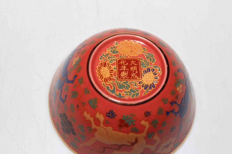 Chinese fine porcelain tea bowl decorated with prancing horses.