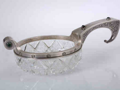 A Russian silver mounted cut glass kovsch, the handle set with two cabochon...