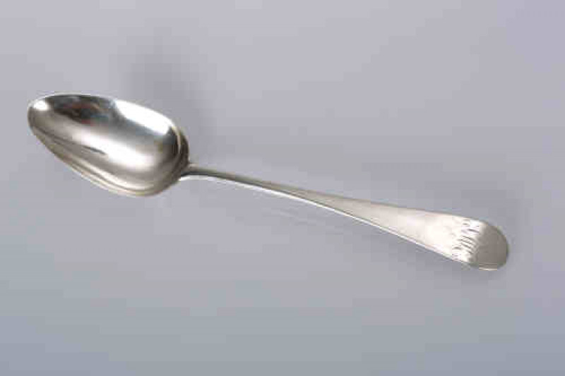 A George III silver table spoon, Hester Bateman, London 1788, Old English pattern, engraved with a monogram. 1.9 troy ozs, 22cm