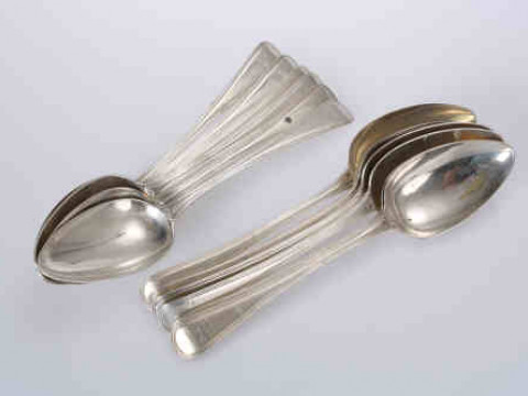 A matched set of twelve George III silver table spoons, Old English Thread...