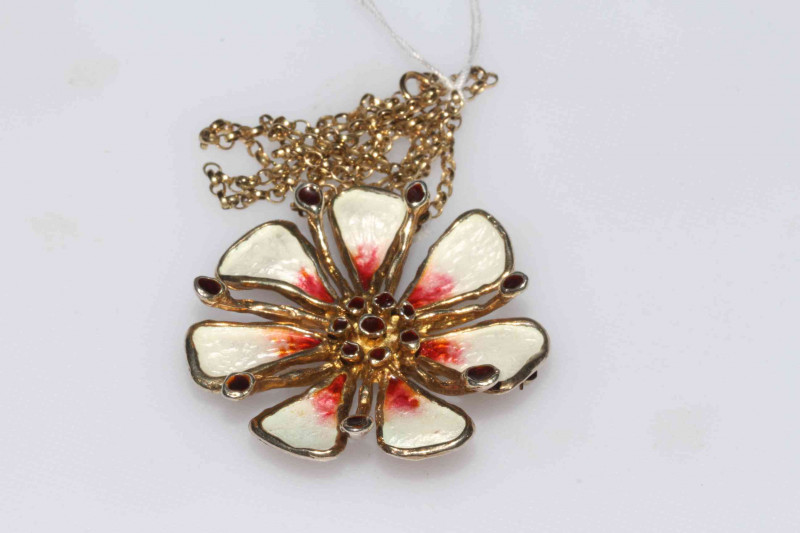 David Anderson silver gilt and enamel pendant/brooch designed by Karl Jorgen Otteren, the flower farm with shaded colour petals and black stamens, with chain, 4.8cm across, marked verso.