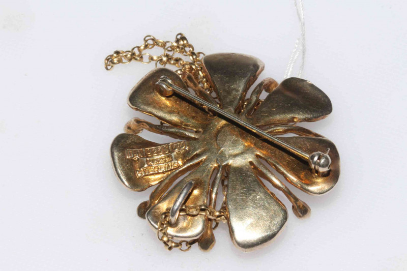 David Anderson silver gilt and enamel pendant/brooch designed by Karl Jorgen Otteren, the flower farm with shaded colour petals and black stamens, with chain, 4.8cm across, marked verso.