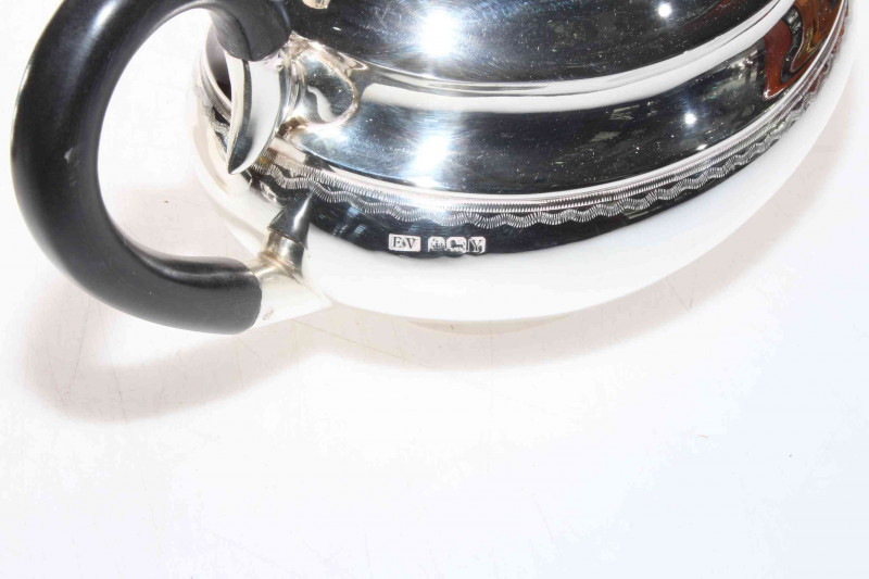 Silver four piece tea set of oval form, Ernest Viner, Sheffield 1966, 55 troy oz gross.