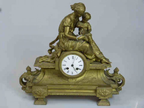 Ornate Gilt Metal Mantel Clock Mounted with Mother and Child Group