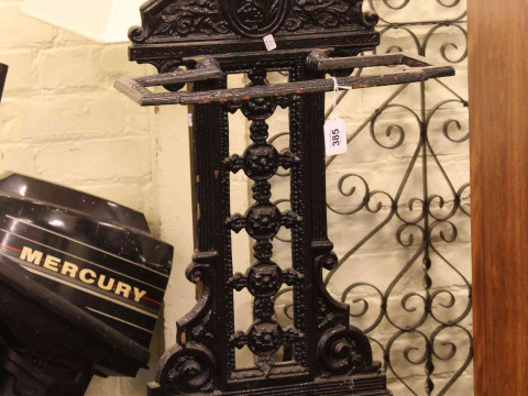 Cast iron stick stand, oak corner chair, Bergere panelled chair, circular brass topped folding table, coal purdonium and bed tray (6). thumbnail