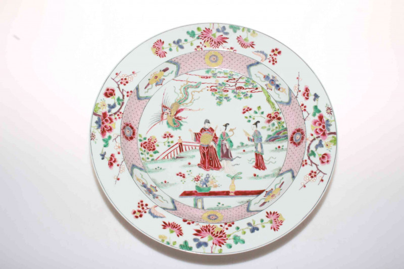 Large Chinese famille rose charger decorated with three figures and phoenix in garden setting, 39cm diameter.
