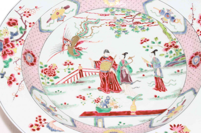 Large Chinese famille rose charger decorated with three figures and phoenix in garden setting, 39cm diameter.