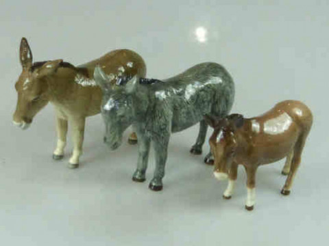 Two Beswick Models of Donkeys and Another Donkey Model (3)