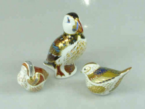 Three Royal Crown Derby Paperweights, each with gold stopper