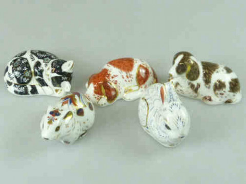 Five Royal Crown Derby Paperweights, each with gold stopper