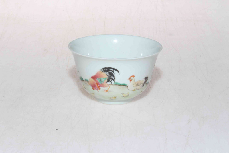 Chinese tea bowl painted with cockerel, hen and chicks, six character mark, 8.5cm diameter.