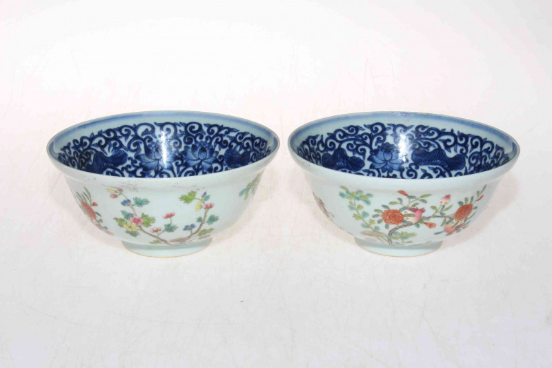Pair Chinese Famille Rose and blue and white bowls, blue mark to base, 15cm diameter.