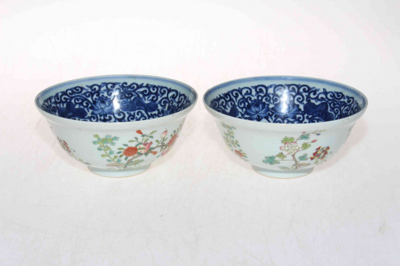 Pair Chinese Famille Rose and blue and white bowls, blue mark to base, 15cm diameter.