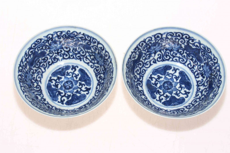 Pair Chinese Famille Rose and blue and white bowls, blue mark to base, 15cm diameter.