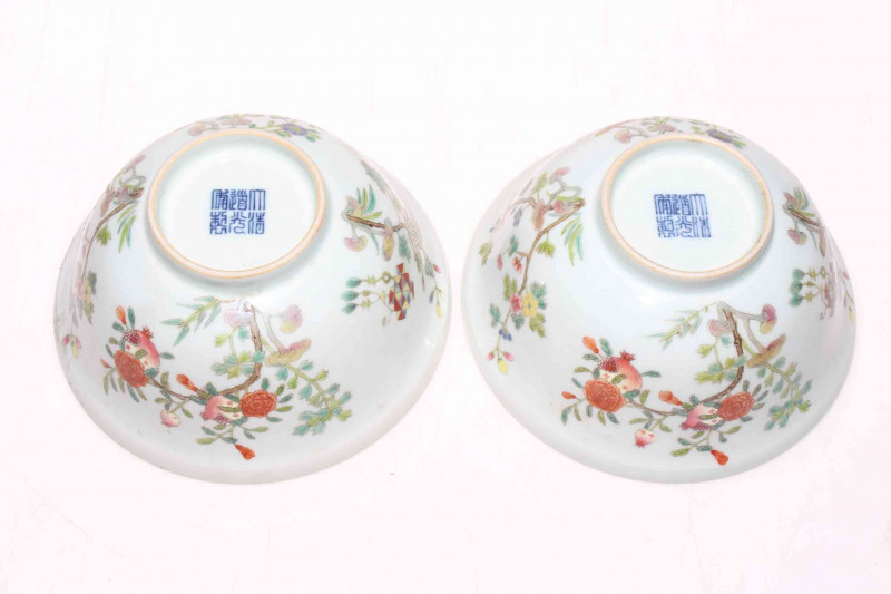 Pair Chinese Famille Rose and blue and white bowls, blue mark to base, 15cm diameter.