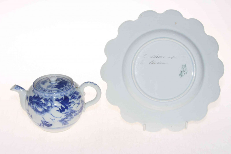 Oriental blue and white teapot and French tortoise and hare plate (2).