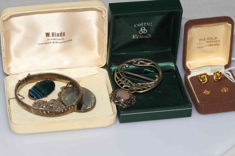 Celtic Edinburgh hallmarked silver brooch, another two brooches, silver bangle and locket, and two pair gold earrings.