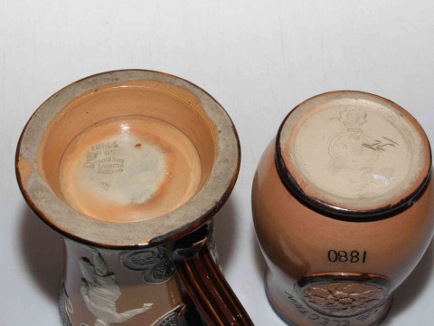 Doulton Lambeth stoneware 'sporting' mug with relief decoration, 15cm, together with Gladstone Leeds Election 1880 baluster beaker (2). thumbnail