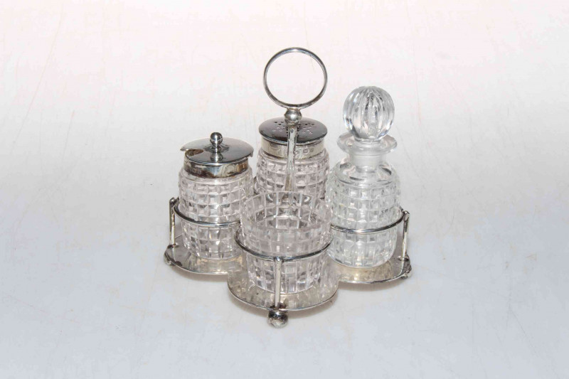 Silver four bottle cruet set, Sheffield 1928.