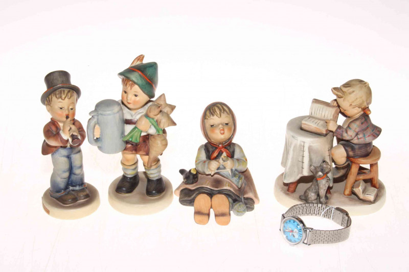 Four Hummel figurines and a 1958 Snoopy wristwatch.