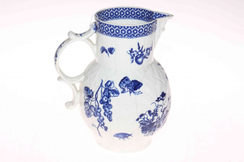 Late 18th Century English porcelain blue and white cabbage lead jug with blue mark to base, 20cm high.