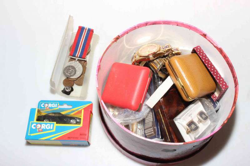 Box including 1790 United Belgian States Austrian William V silver coin, 1935 silver crown, costume jewellery, watches, Corgi toy, cased table clocks, medal etc.