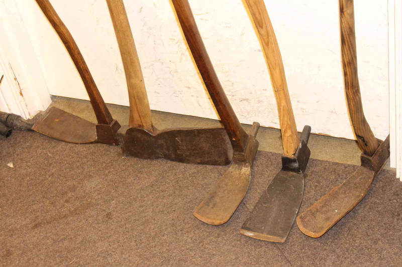 Four vintage picks and axe.