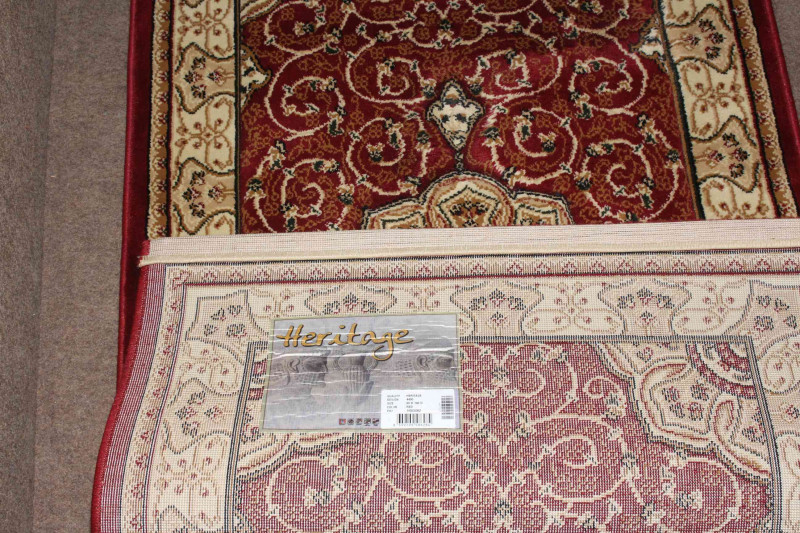Wilton rug 1.83 by 0.91 and Heritage rug 1.40 by 0.80 (2).