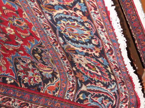 Large hand made Iranian red ground carpet from the Mashad region, 395 by 290cm. thumbnail